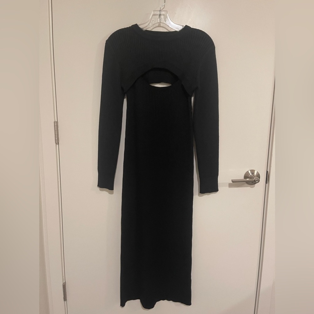 NWOT Size medium ASTR black long sleeve midi dress with cutout in chest area
